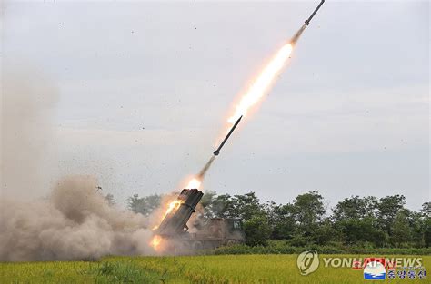 seo agency seoul|North Korea test fires 240mm rocket launcher with ‘new guiding .